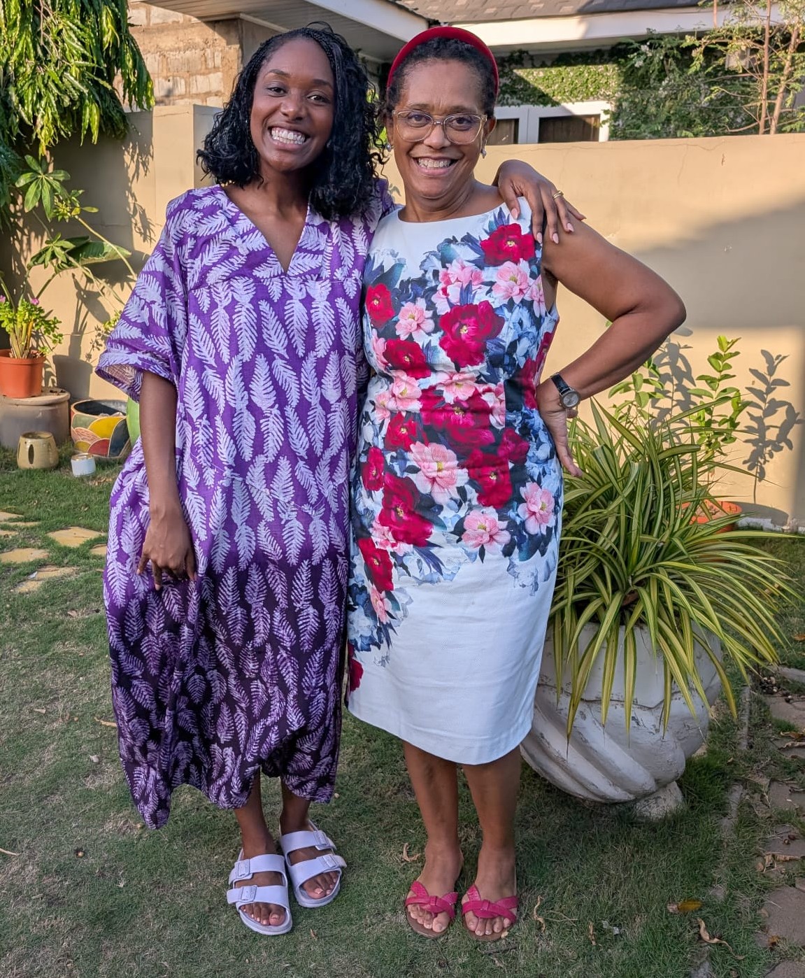 Lizzi and Mum in garden smiling