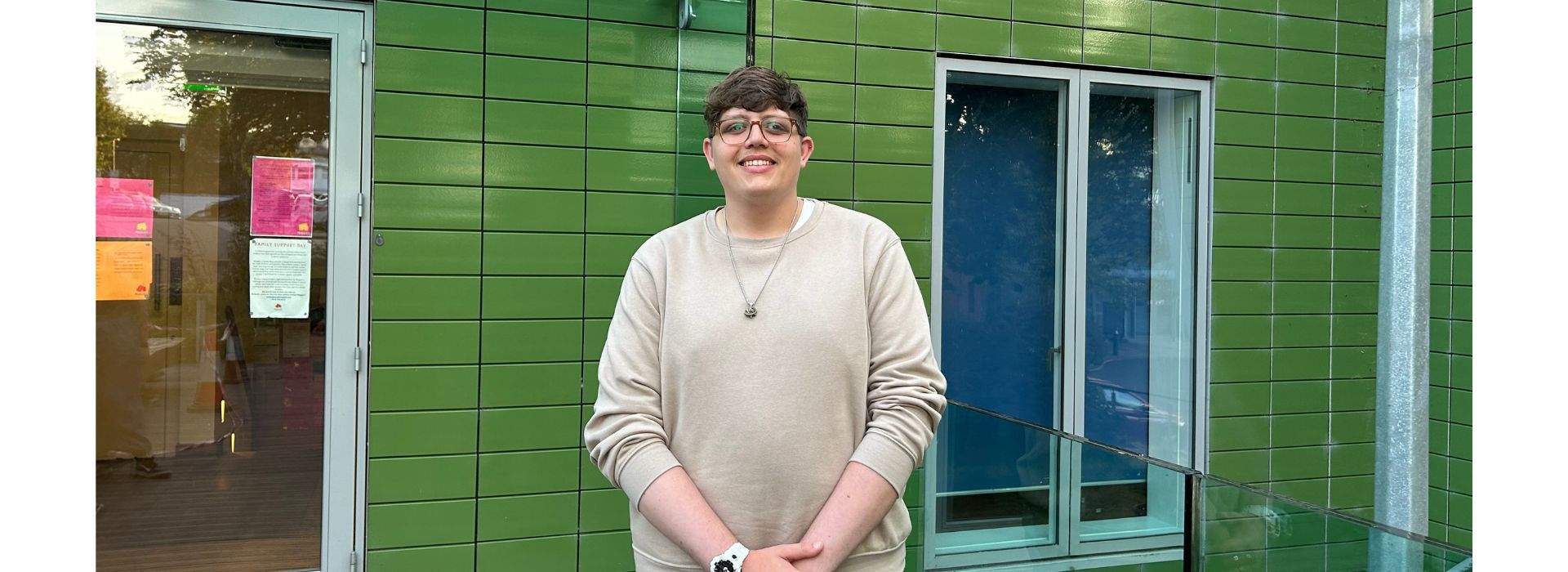 Centre visitor, Sam, standing in front of Maggie's in Nottingham