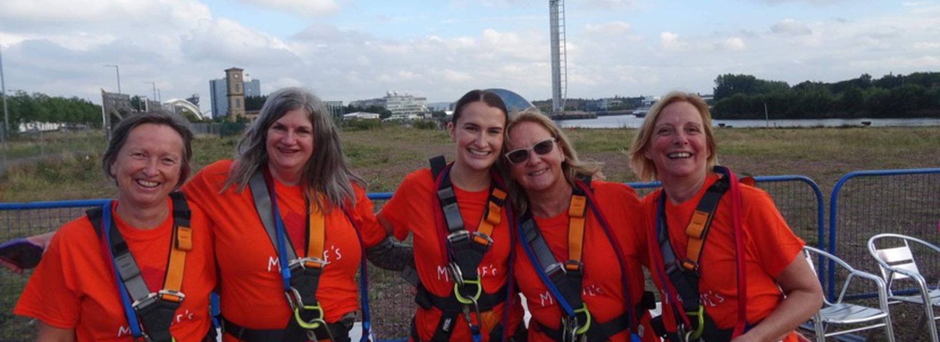 Group of Maggie's zipslide fundraisers in harnesses