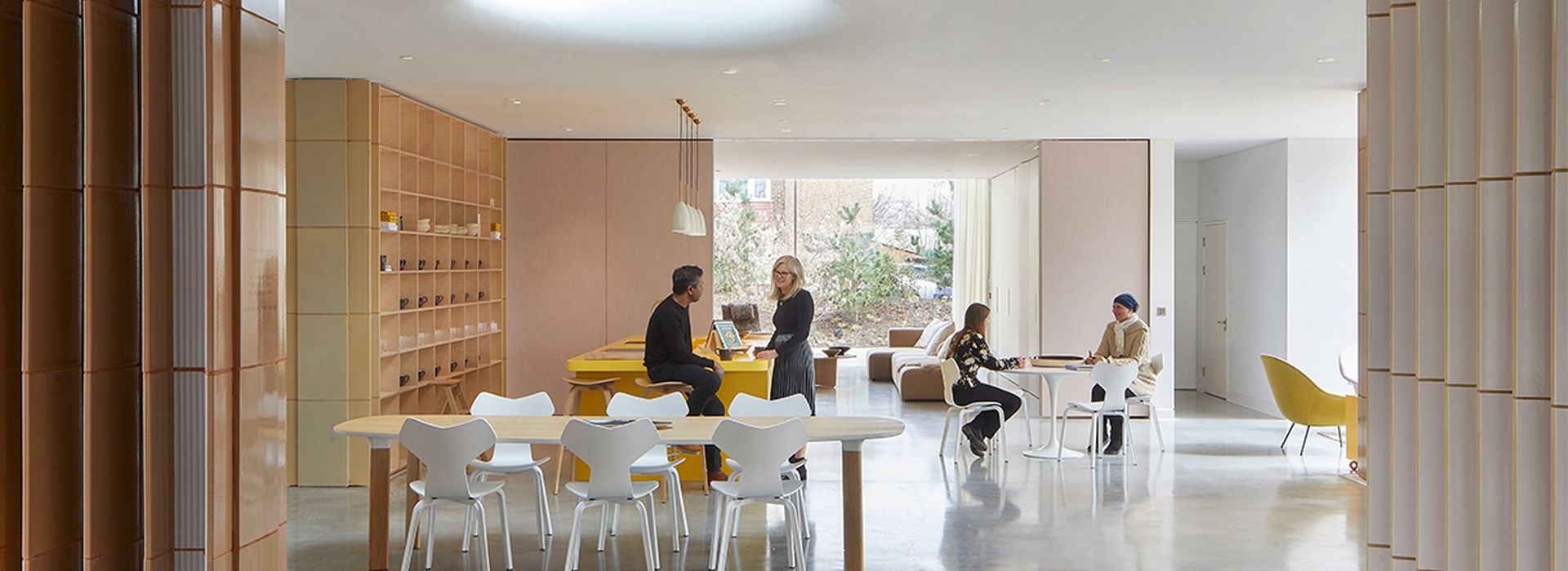 Landscape of Southampton centre kitchen table with people talking in background