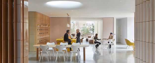 Landscape of Southampton centre kitchen table with people talking in background