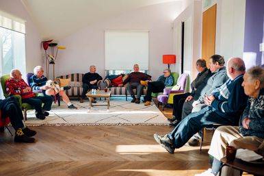 A mens support group in session