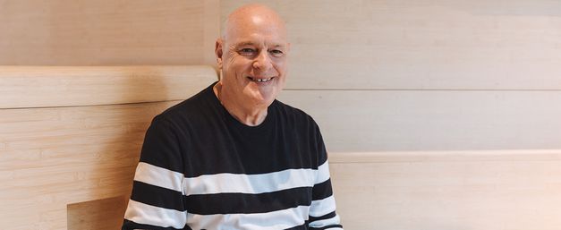 Portrait of Mike, smiling in Maggie's centre