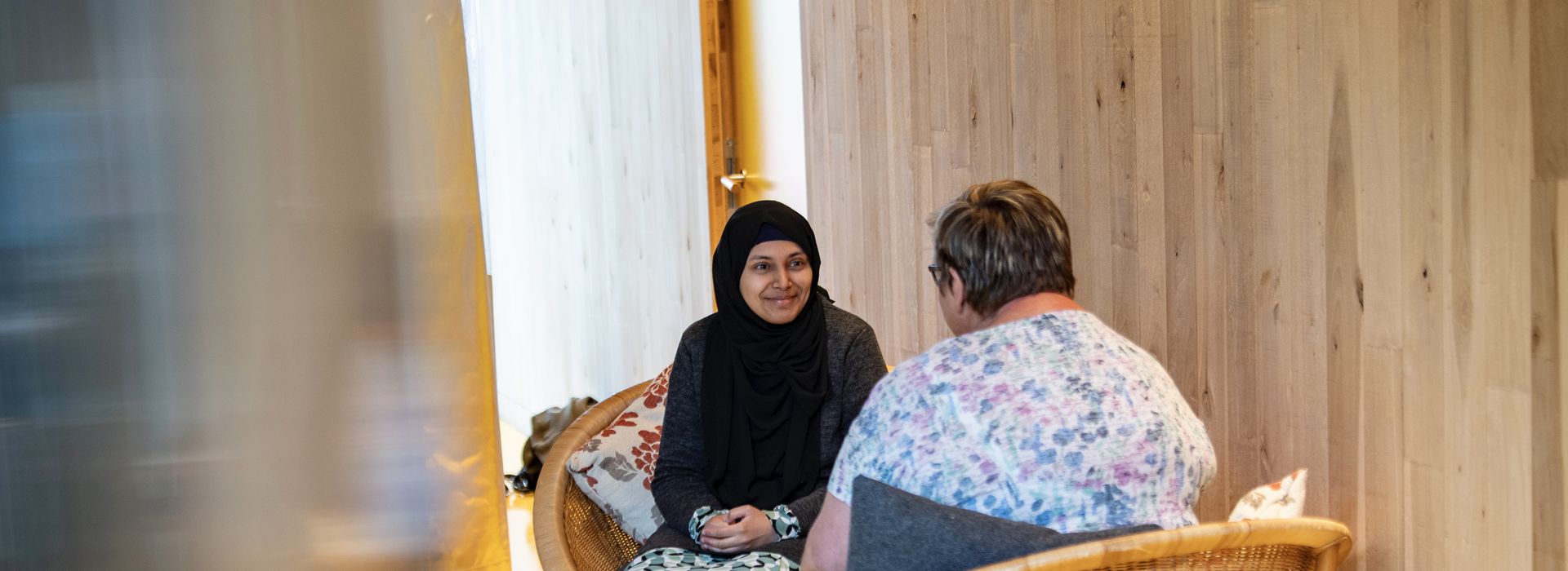 Komal sat opposite Maggie's Centre Head Trish