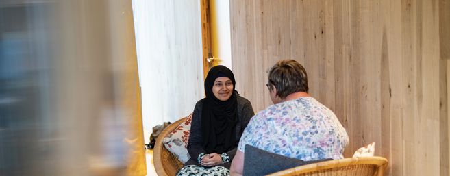 Komal sat opposite Maggie's Centre Head Trish