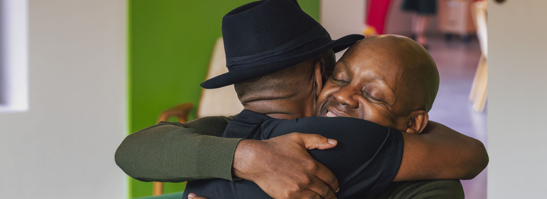 Mark and Mike, two brothers, hugging