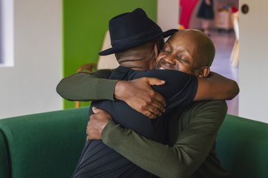 Mark and Mike, two brothers, hugging