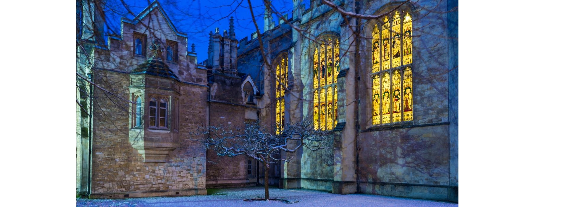 Landscape of Trinity Church, Cambridge in the snow at night